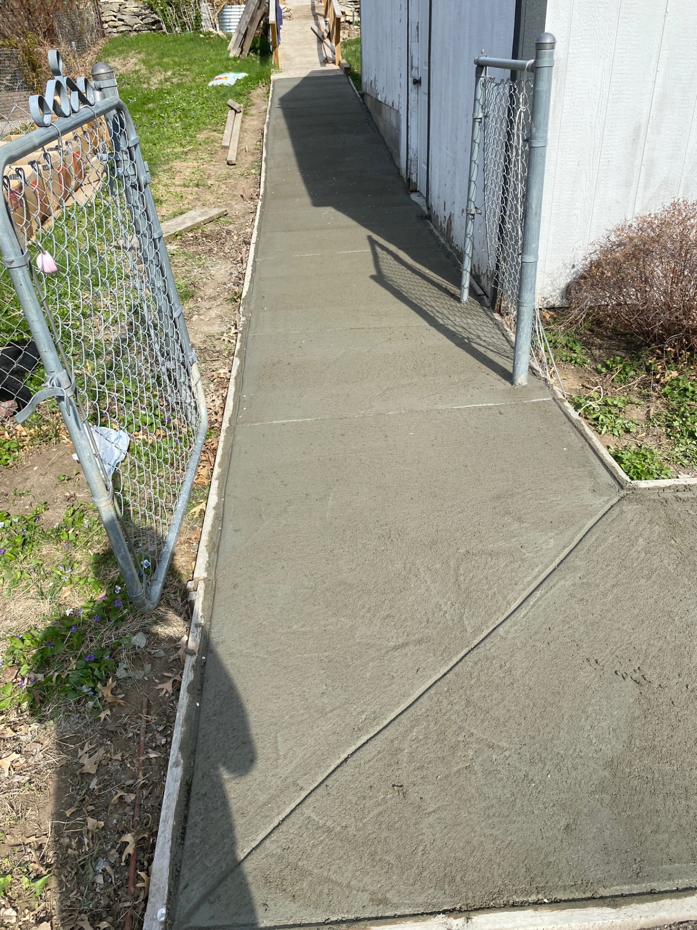 Side-Yard Concrete Walkway — Gate view