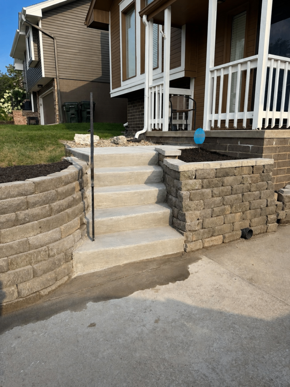 Front steps & retaining walls — After